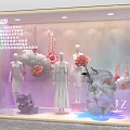 Elegant Store Window Display With White Mannequins Rose Flowers And Decorations