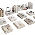 Stacked Books and Magazines with Various Cover Designs on Neutral Background