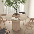 Round Wooden Dining Table And Chairs In Modern Indoor Space With Green Plant And Arched Window