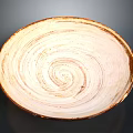 Hand Carved Ceramic Plate With Spiral Pattern Brown Rim And Creamy White Surface Artisanal Craftsmanship