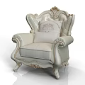 Elegant Single Sofa With Ornate Carved Details And Exquisite Decorative Pillows
