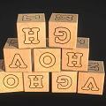 Colorful Wooden Building Blocks with Numbers and Letters Stacked in Pyramid Shape