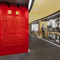 Modern Exhibition Space With Red Walls White Display Boards And Glass Cases