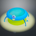 Blue Round Trampoline With Green Base Blue Legs Small White Logo And Yellow Glow