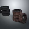 Stacked And Single Old Rubber Tires With Worn Surfaces On Gray Background