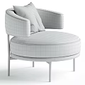 Modern Beige Fabric Armchair With Curved Armrests Round Seat And Black Metal Legs