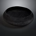 Hand Carved Dark Stone Bowl Shaped Sculpture With Textured Surface