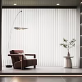Modern White Vertical Blinds In Living Space With Brown Armchair Floor Lamp And Green Plant