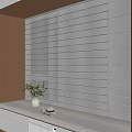 White Window Blinds on Wooden Frame with Cushioned Sill and Potted Plant