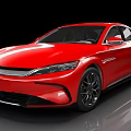 Red Modern Electric Sedan With Streamlined Body And Black Alloy Wheels