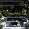 Modern Outdoor Landscape Seating With Central Stone Table And Surrounding Greenery 3d model