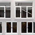 Modern Casement Windows in White and Brown for Building Exterior with Clear Views