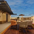 Cozy Outdoor Terrace With Wooden Flooring Table And Chairs Sunshade Umbrella And Flower Bushes