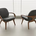 Modern Leisure Chairs With Wooden Frame And Dark Upholstery In Bright Interior