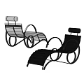Two Modern Lounge Chairs With Curved Metal Frames And Wooden Backrests