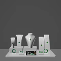 Elegant Green Jewelry Collection with Necklaces Pendants and Bracelets on White Display Stand