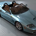 Blue Convertible Ferrari Sports Car With Brown Leather Seats And Shiny Exterior
