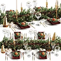 Christmas Themed Tableware Set With Greenery Red Placemats Gold Cutlery Wine Glasses And Oranges
