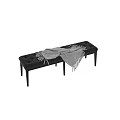 Stylish Tufted Sofa Bench With Dark Gray Upholstery And Black Slender Legs And Light Blanket