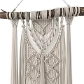 Cream Colored Macramé Wall Hanging With Wooden Stick And Tassels Design