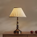 Classic Table Lamp With Striped Lampshade And Metal Base On Wooden Table