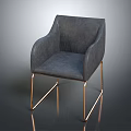 Modern Gray Upholstered Accent Chair with Armrests and Gold Metal Legs on Reflective Surface