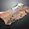 Layered Terrain Landscape With Red Brown White Color Patterns And Green Vegetation Patches