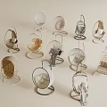 Various Modern Stylish Hanging Chairs With Woven Seats And Metal Frames