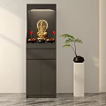 Black And White Buddhist Shrine Cabinet With Buddha Statue Candles Offerings And Potted Plant