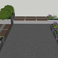 Outdoor Chairs in Urban Seating Area with Green Plants and Flower Planters