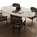 Modern Dining Table Set with Oval Light Colored Tabletop Four Chairs Black Bowl and Books