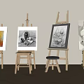 Wooden Art Easels Displaying Paintings On Light Colored Wall And Wooden Floor