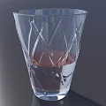 Elegant Transparent Wine Glass With Diamond Cut Pattern And Red Liquid On Dark Background