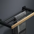 Wall Mounted Black Metal Towel Rack With Wooden Accent And Gray Towel