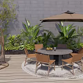 Outdoor Table And Chairs Set With Umbrella On Wooden Deck Surrounded By Green Plants