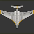 Shiny Silver Model Airplane With Yellow Wingtips Tail And Black Cross Symbols