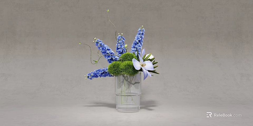 Transparent Glass Vase With Blue Flowers Green Foliage And White Orchid 3d model 