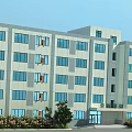 Modern Multi Story School Building With Large Windows Green Plants And Open Space