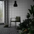Indoor Plant Combinations With White Tiled Wall Black Pendant Lamp And Pebble Floor