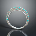 Unique Handcrafted Silver Ring Adorned With Blue Gemstones And Ornate Decorative Patterns