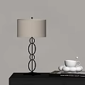 Elegant Table Lamp With Gold Ring Base Linen Shade And White Cup On Table 3d model