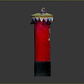 Artistic Red Decorative Column Featuring Colorful Triangular Top Ornaments And Small Toy Vehicle