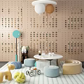 Kids Table in Playroom with Perforated Wooden Wall Colorful Balloons Soft Padded Stools Fun Toys
