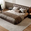 Modern Bedroom Interior With Leather Headboard Multiple Pillows Brown Throw Blanket And Wooden Floor