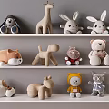 Plush Animal Toys Display With Various Stuffed Figures On White Shelves