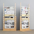 Wooden Magazine And Newspaper Display Racks With Multiple Shelves Holding Various Publications