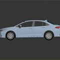 Modern Light Blue Toyota Sedan With Brown Interior And Silver Alloy Wheels