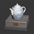 Elegant Gray Furniture Display Base With Golden Plaque And Blue White Floral Teapot