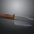Tactical Knife With Wooden Handle And Metal Blade On Dark Background