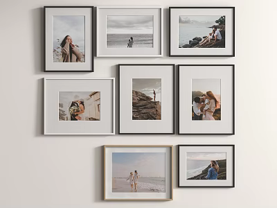 Stylish Photo Wall With Multiple Frames Featuring Various People And Landscape Photos On White Wall 3d model